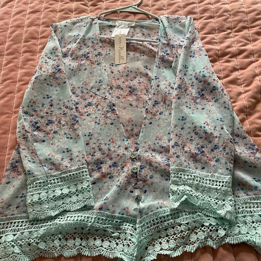 Beautiful lightweight never worn floral cardigan.
